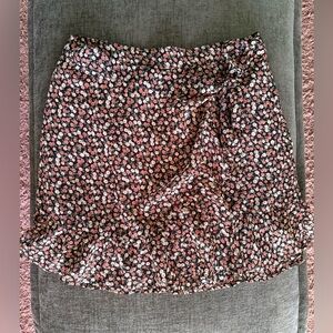 Two Ultra High Rise Hollister Floral Mini Skirts